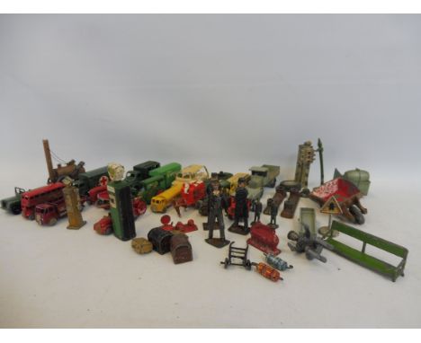 A tray of playworn early series Lesneys plus some Britains figures and accessories and a Britains tractor.