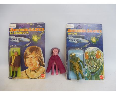 Battlestar Gallactica by Mattel, circa 1978 a carded figure of Lieutenant Starbuck, a second carded figure The Insect Enemy, 