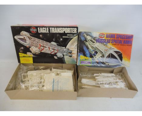 Two Airfix space model kits, both Space 1999, the hawk spaceship and eagle transporter, both unchecked but appear in excellen