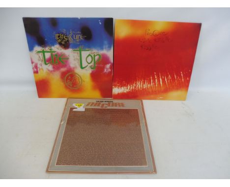 Three The Cure albums: The Peel Sessions, Kiss Me with poster insert and The Top, all in excellent condition, covers with som