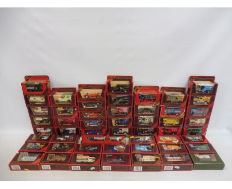 A large box of Matchbox models of Yesteryear, mostly ruby boxes.