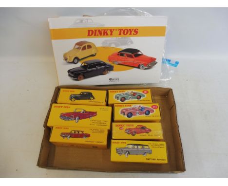 A collection of seven Dinky Atlas, with an Atlas collections manual, to include Triumph sportscars, Cheverolet etc.
