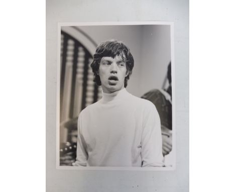 An original David Redfern photograph - image of Mick Jagger from the Rolling Stones, circa 1960s, with acreditation label to 