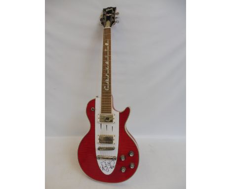 An electric guitar marked Gibson Corvette, signed 'To Steve Believe Nils Lofgren' guitarist of Bruce Springsteen's E Street B