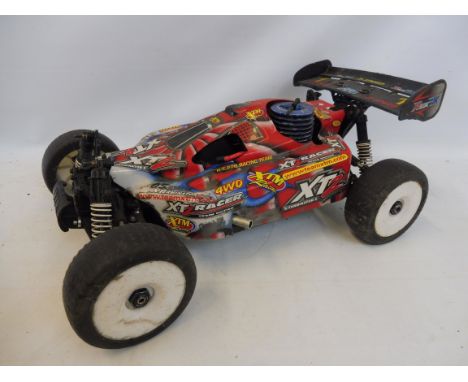 An XTM Racing XT2 Terminator 2 4WD Force 21 engine, 1/8 scale.