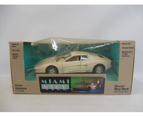 An unusual Burago Miami Vice die-cast model of the Ferrari Testarossa, 1/24th scale.