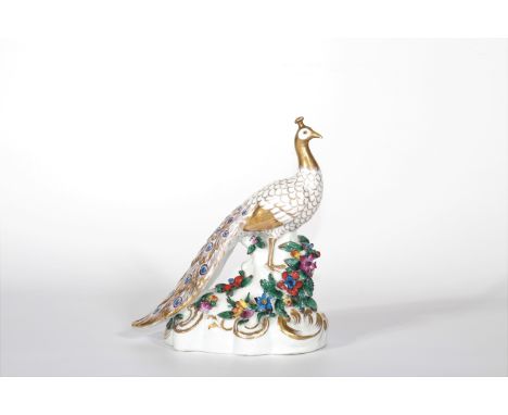 Porcelain of Capodimonte "the Peacock"Period: XXth - 20th centurySizes: H=200mm L=190mmWeight (K): 0,815kg