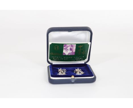 Salvador Dali. "Hombre sobre delfin". Cufflinks. Solid silver sculpture of a man on the back of a dolphin. Signed on the fron