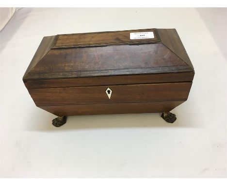 Georgian mahogany tea caddy  set on grass pad feet brass mounted 