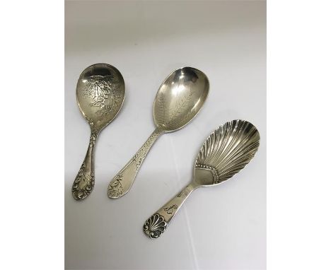 Three silver tea caddy spoons. All with full English silver hallmarks