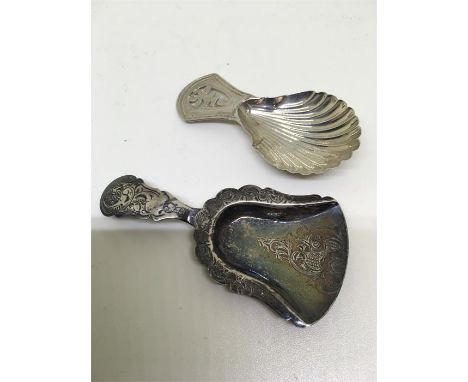 Two Georgian silver tea caddy spoons.  Solder repairs to handles 