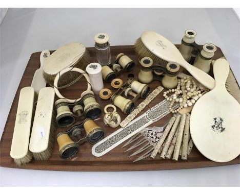 Large collection of antique ivory including opera glasses brush set bottles netsuke etc