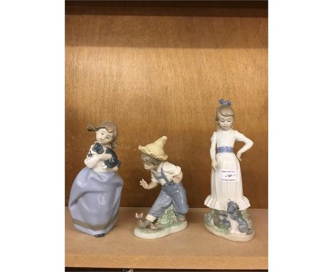 Three Nao figurines
