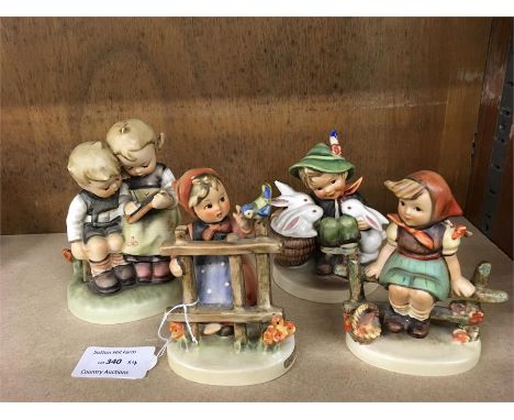 4 Hummel Figures