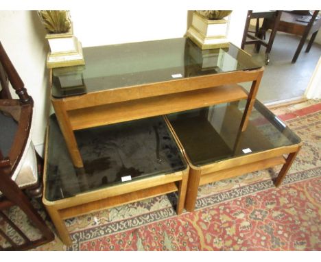 Pair of mid 20th Century teak and glass lamp tables, together with a matching rectangular coffee table 