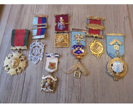 Group of seven various silver gilt and enamel Masonic medallions on ribbons 