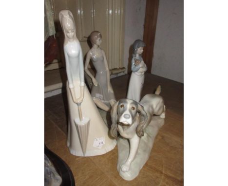 Nao figure of a young girl holding a puppy and three similar figures of two ladies and a dog 