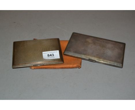Two silver engine turned cigarette cases with gilt interiorsBoth in good condition, just need cleaning. 11 troy ounces 