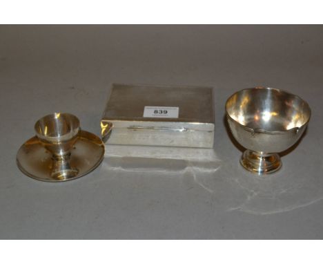 Sterling silver rectangular cigarette box with engine turned cover, silver circular pedestal dish (at fault) and a silver egg