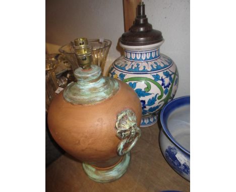 Pottery baluster form vase decorated in bright colours with flowers (converted to a lamp base) and another pottery baluster f