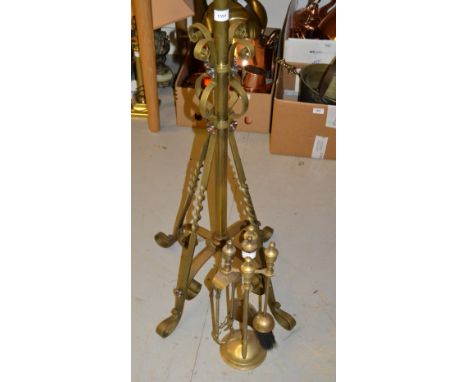 Brass adjustable column oil lamp standard, together with a brass companion set 