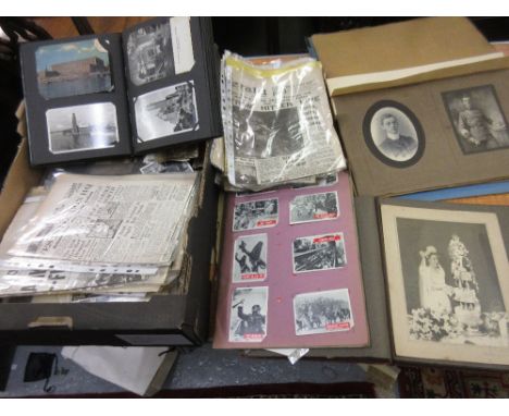 Box containing a quantity of miscellaneous postcards, vintage newspapers and sundries 