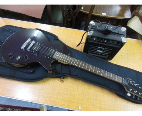 Epiphone six string electric guitar with travel case and a small Aria amplifier 