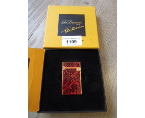 Dupont ' Fantaisies ' cigarette lighter in original boxGenerally in excellent condition. Some very light surface scratches bu