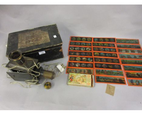 Late 19th / early 20th Century childrens magic lantern with various slides in original fitted box 