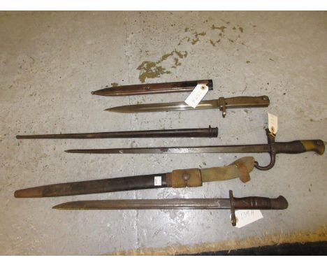 Three various World War II bayonets with scabbards and a quantity of 'Picture Post' magazines 