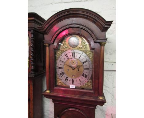 Figured walnut longcase clock, the broken arch hood with flanking pilasters above a moulded panel door and conforming plinth 