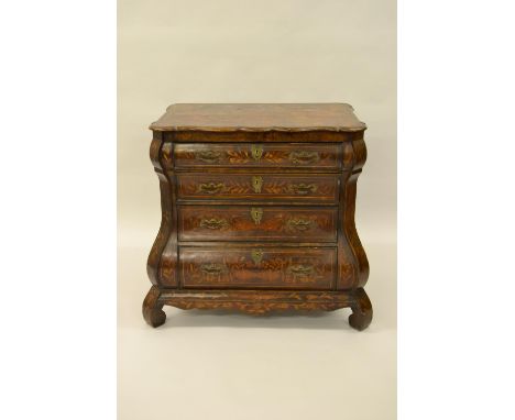Late 18th / early 19th Century Dutch marquetry bombe commode, the shaped moulded top above four drawers with brass handles an