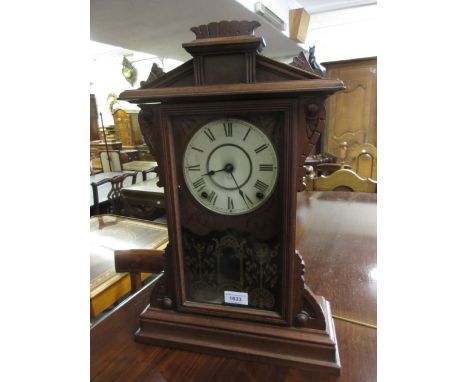 19th Century American walnut cased two train mantel clock and an oak cased two train mantel clock 