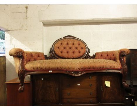 Reproduction carved mahogany and button upholstered drawing room sofa in Victorian style (at fault) 