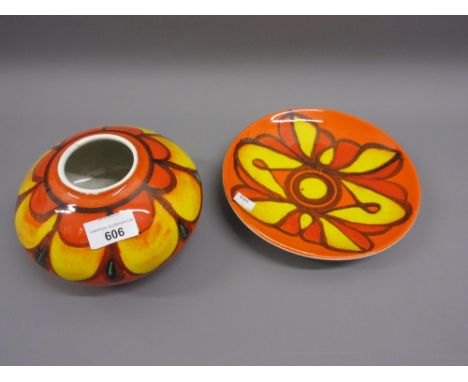 Poole pottery squat form vase in orange and yellow and a similar small Poole pottery plate 