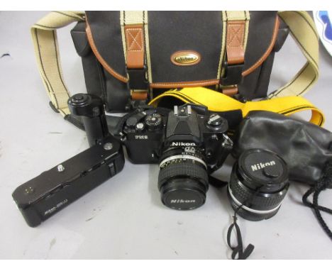 Nikon FM2N 35mm camera outfit with motor drive and three lenses, 35mm F2, 85mm F2 and 24mm 2.8 wide angle, housed in a Nikon 
