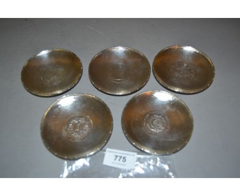 Group of five London silver trinket dishes inset with various Chinese silver coinsCoins are mounted in dishes, some wear to t