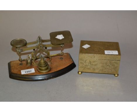 Pair of small brass postal scales with weights together with a Chinese brass box engraved with a dragon 
