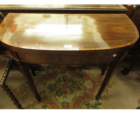 George III mahogany rosewood crossbanded and line inlaid D-shaped fold-over card table, raised on square tapering supports wi