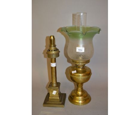 Brass baluster form oil lamp with green and etched glass shade and another brass column lamp (at fault) 