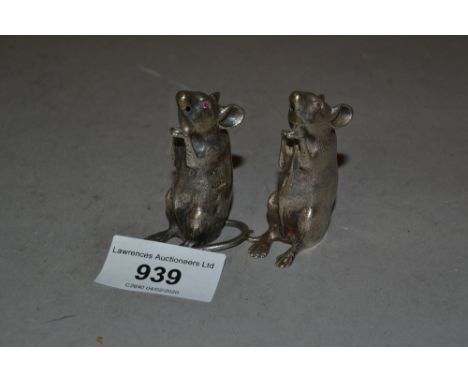 Two Birmingham silver salts in the form of mice with ruby set eyes, 2ins tallBoth are in good useable condition, need cleanin