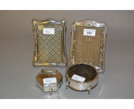 Two silver mounted photograph frames together with two silver trinket boxes (at fault) 