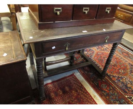 18th Century oak side table, the moulded top above a single drawer with brass drop handles on bobbin turned supports with str