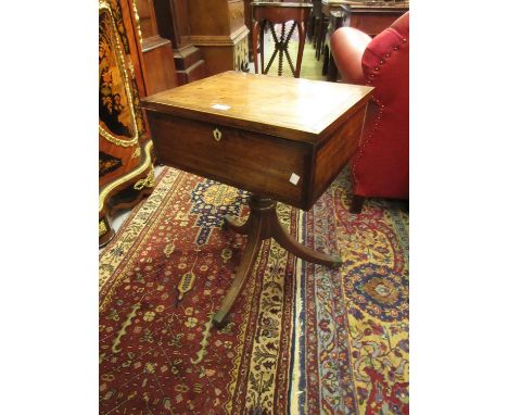 George III mahogany line inlaid and crossbanded teapoy, the hinged lid enclosing a fitted interior above a turned column and 