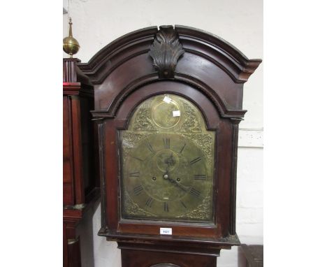 18th Century figured mahogany and inlaid longcase clock, the arched hood with fluted pilasters above an arched door in a late