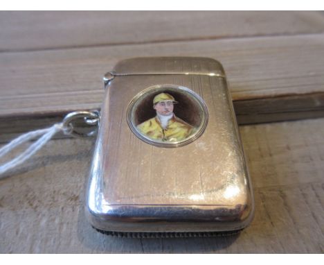 Chester silver vesta case with painted enamel decoration of a jockey in gold cap and jacketLight scratching to silver and ena