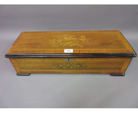 19th Century Swiss musical box, the marquetry inlaid and transfer decorated rosewood case enclosing a 28cm cylinder and one p