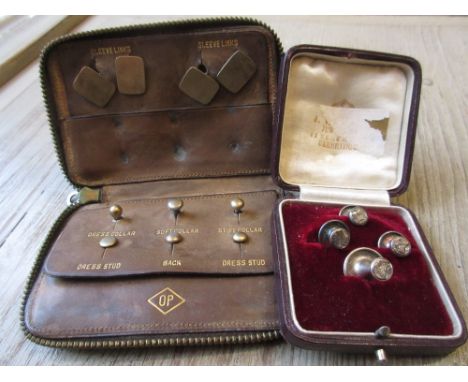 Leather wallet containing six 9ct gold studs, pair of 9ct gold cufflinks and a boxed set of four engraved silver bachelor but