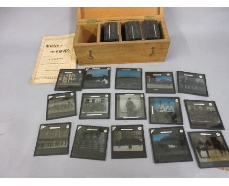 Set of sixty coloured magic lantern slides, ' Armies of Europe ' with accompanying lecture pamphlet, housed in a pine box 