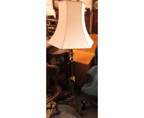 19th Century brass telescopic standard lamp on triform base, with cream shade 